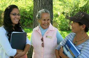 Photograph of TRU Elder Estella Patrick Moller with 2 TRU students