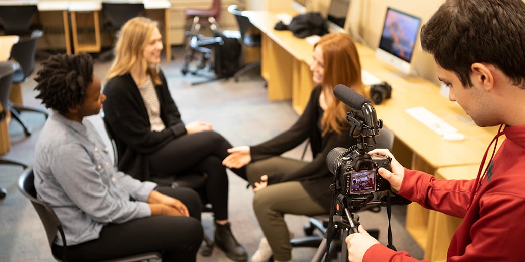 Journalism students doing video interview