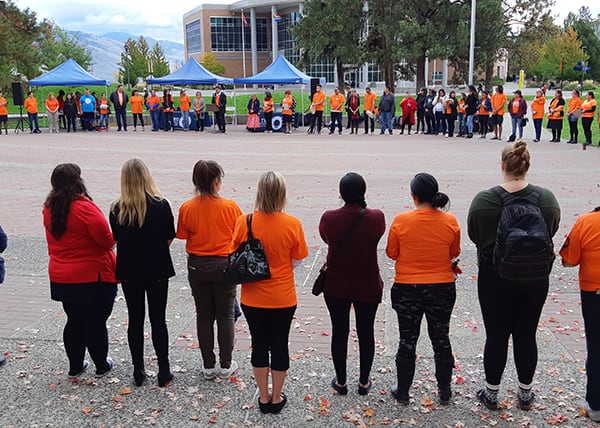 Students wearing orange shirts