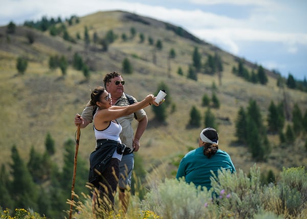 Kamloops background with people taking photos