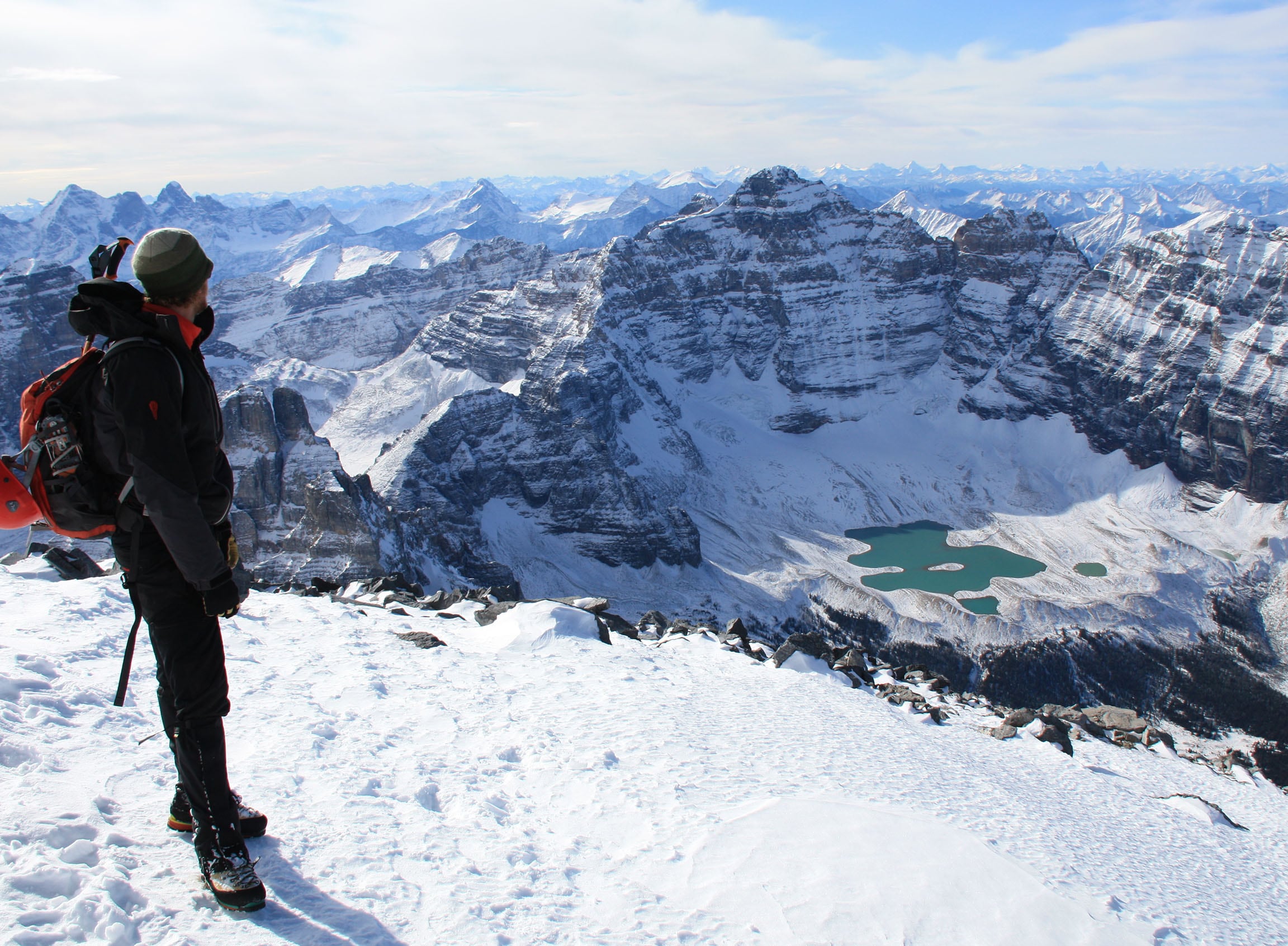 student at top of mountain