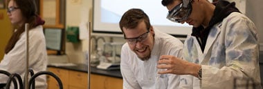 Students performing experiment